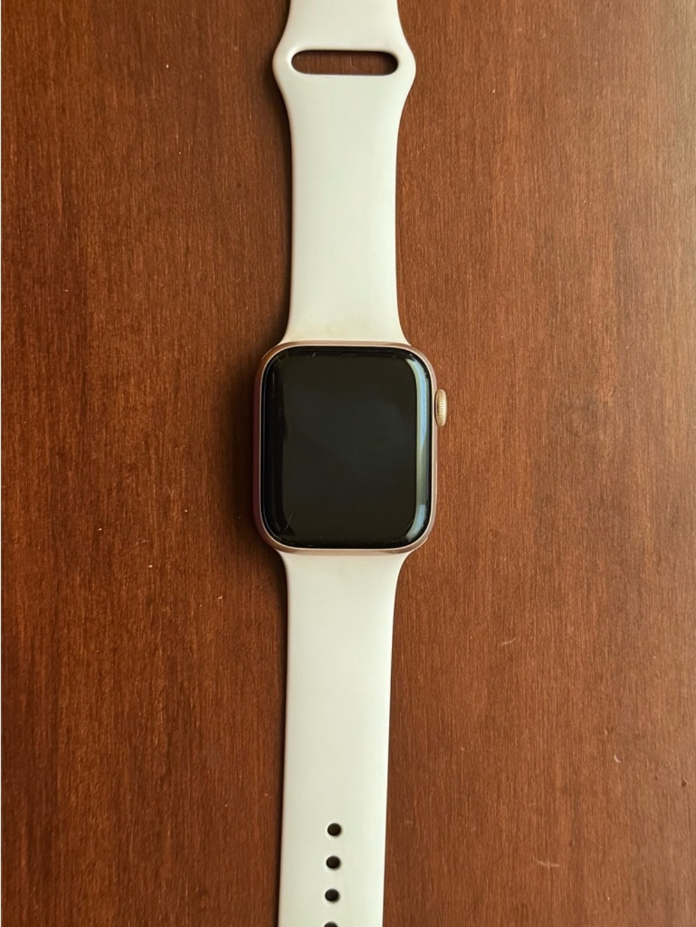 Apple Watch with Pink Sport Band.
